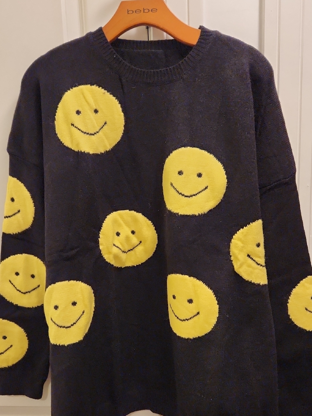 NWOT Black Sweater with Yellow Smiley Pattern